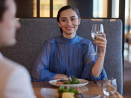 Couple dining at RACV Torquay Number One Restaurant.