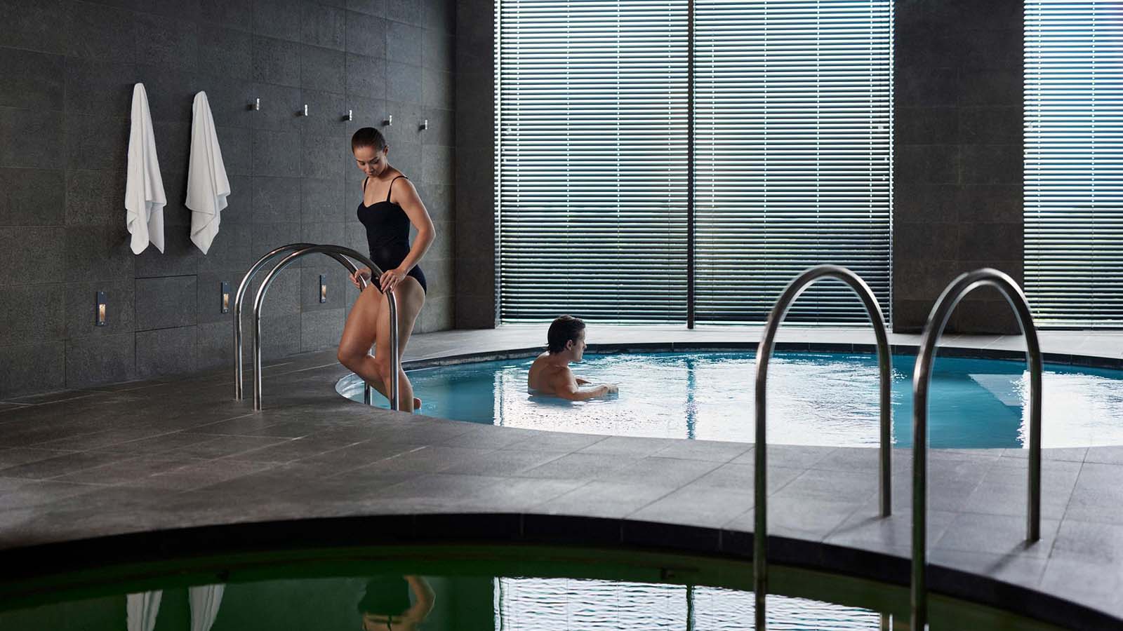 Couple enjoying the relaxation pool at RACV Torquay One Spa.