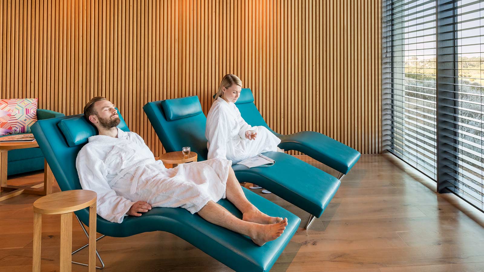 Couple seated in the relaxation lounge at RACV Torquay One Spa.