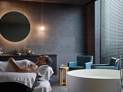 Client lying down awaiting a treatment in the Torquay one spa room.