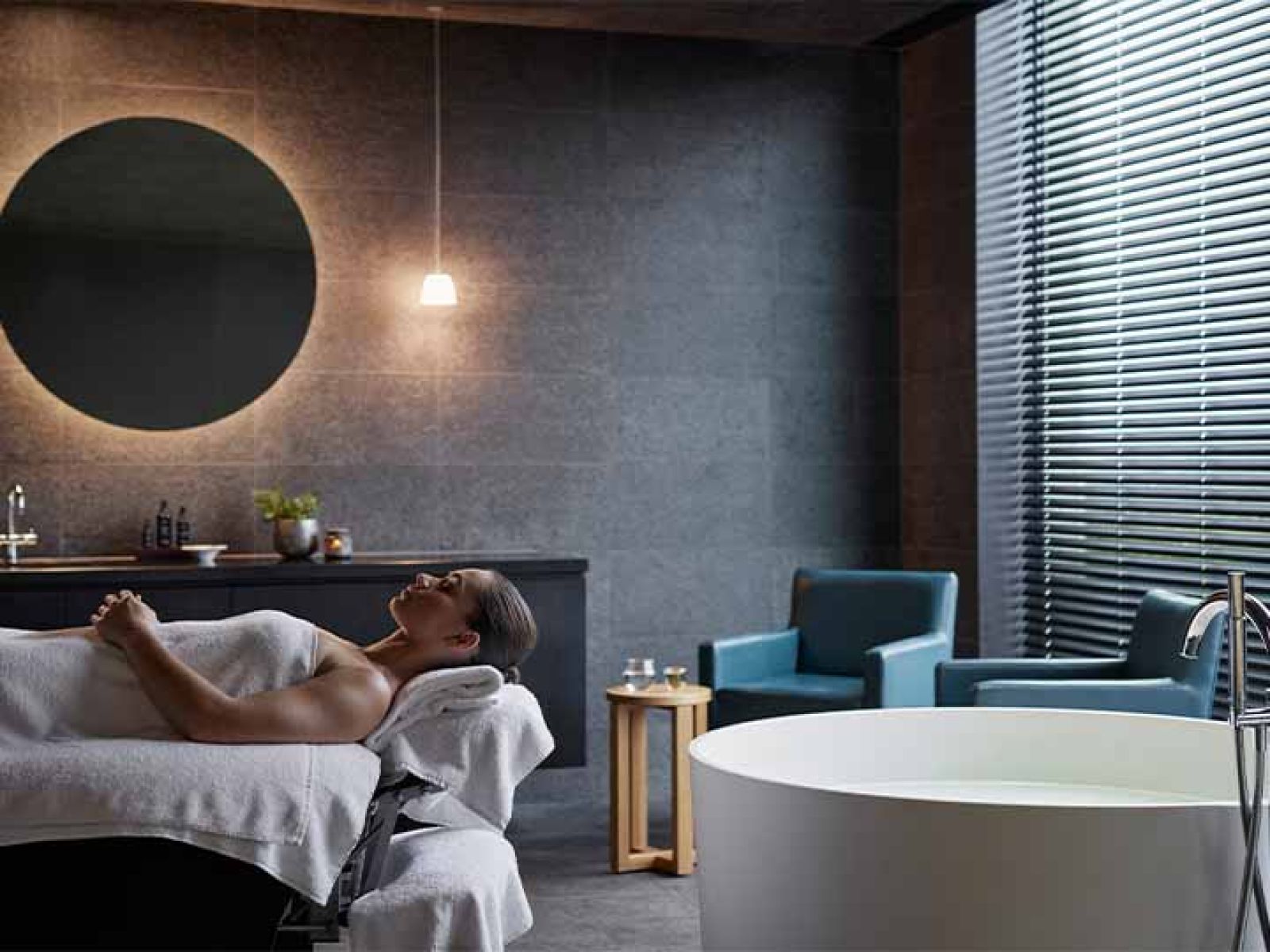 Client lying down awaiting a treatment in the Torquay one spa room.