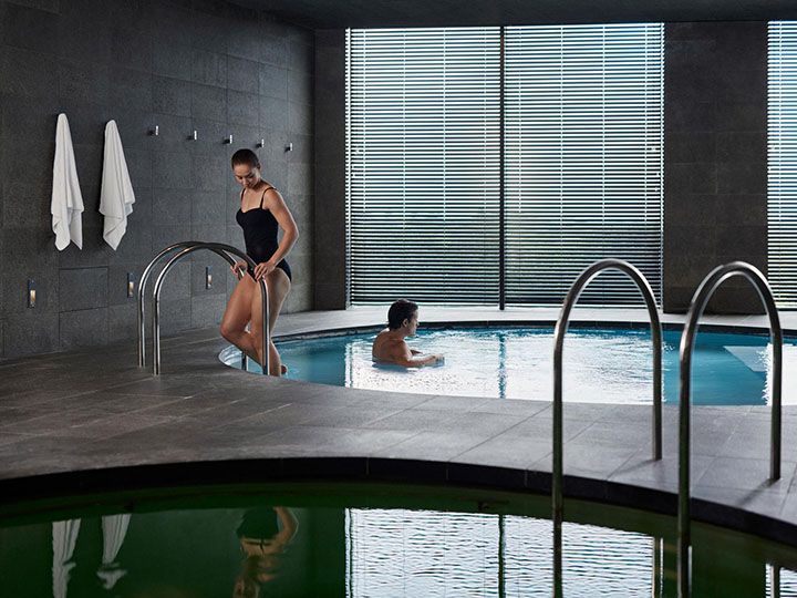 Couple enjoying the relaxation pool at RACV Torquay One Spa.