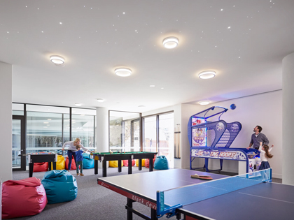 Torquay games room feauturing a ping pong table, billiards table and bean bags. 