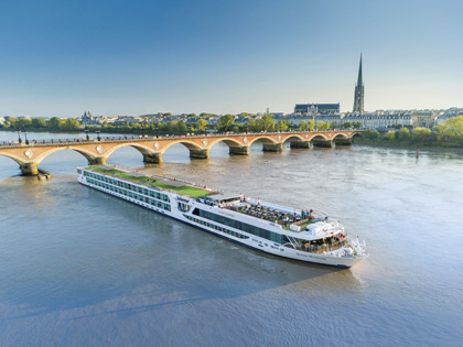 Cruise ship going down a river in Bordeaux