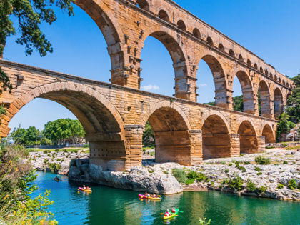 Nimes in France with people in canoes