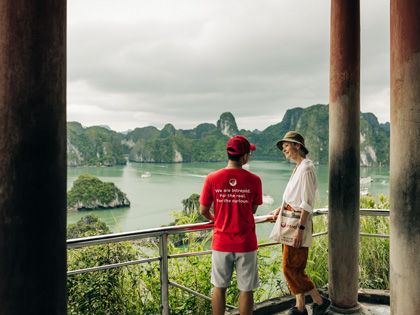 Woman overlooking a view with an Intrepid tour guide