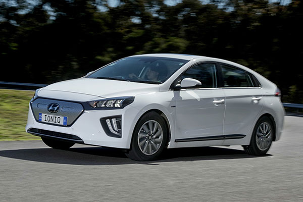 White Hyundai Ioniq Electric Premium in action on a test track