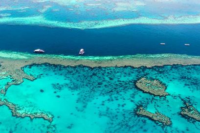 Aerial view of the Great Barrier Reef with cruise ships
