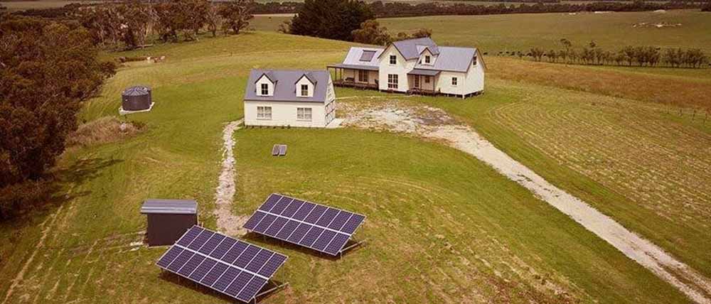 Aerial view of a Victorian farm with off-grid solar panels.