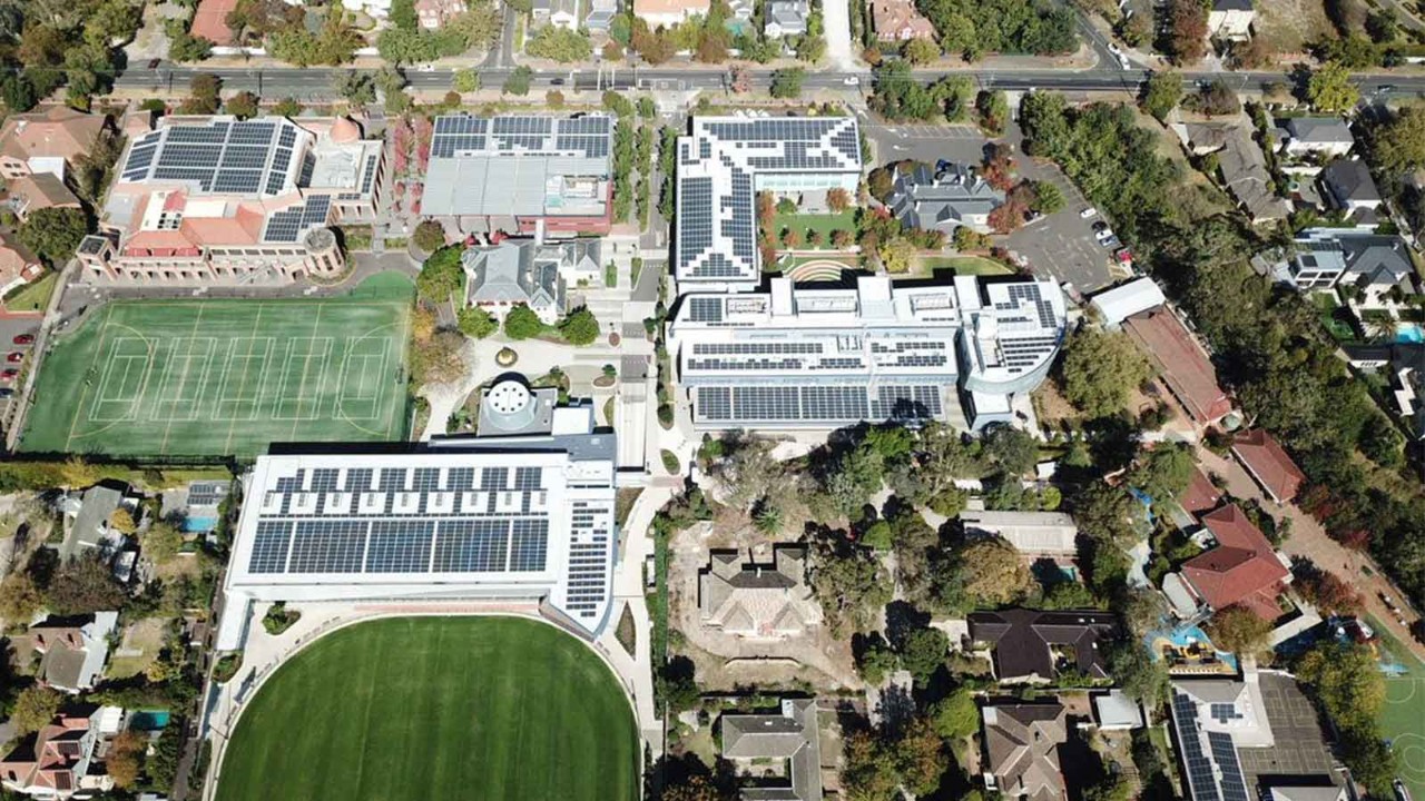 racv-solar-camberwell-grammar-1600x900.jpg Aerial view of solar panels installed on Camberwell Grammar classroom buildings.