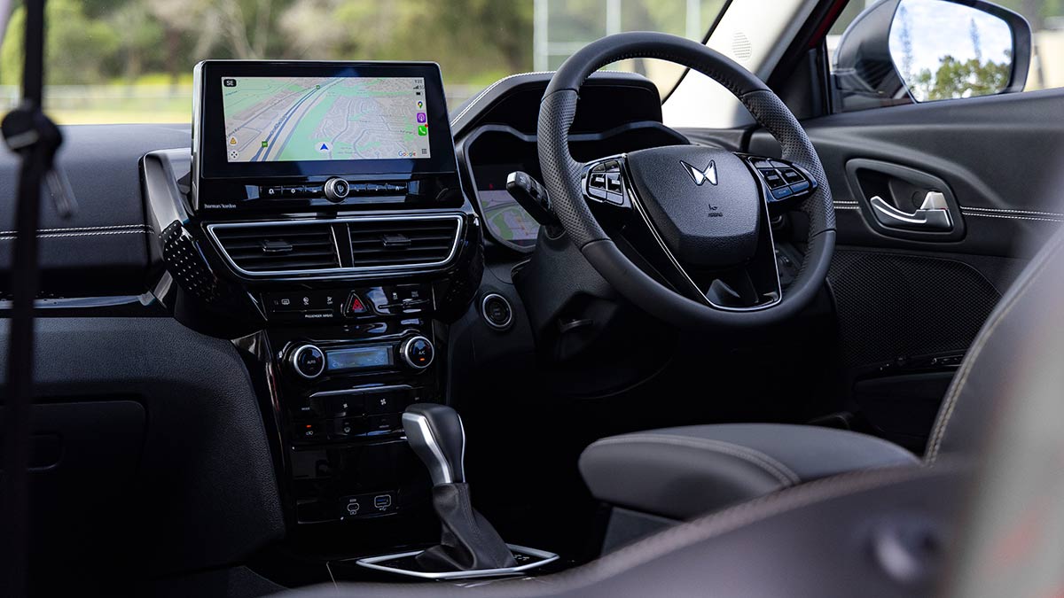 View of dashboard and driver's cockpit from rear seat of Mahindra XUV 3XO small SUV