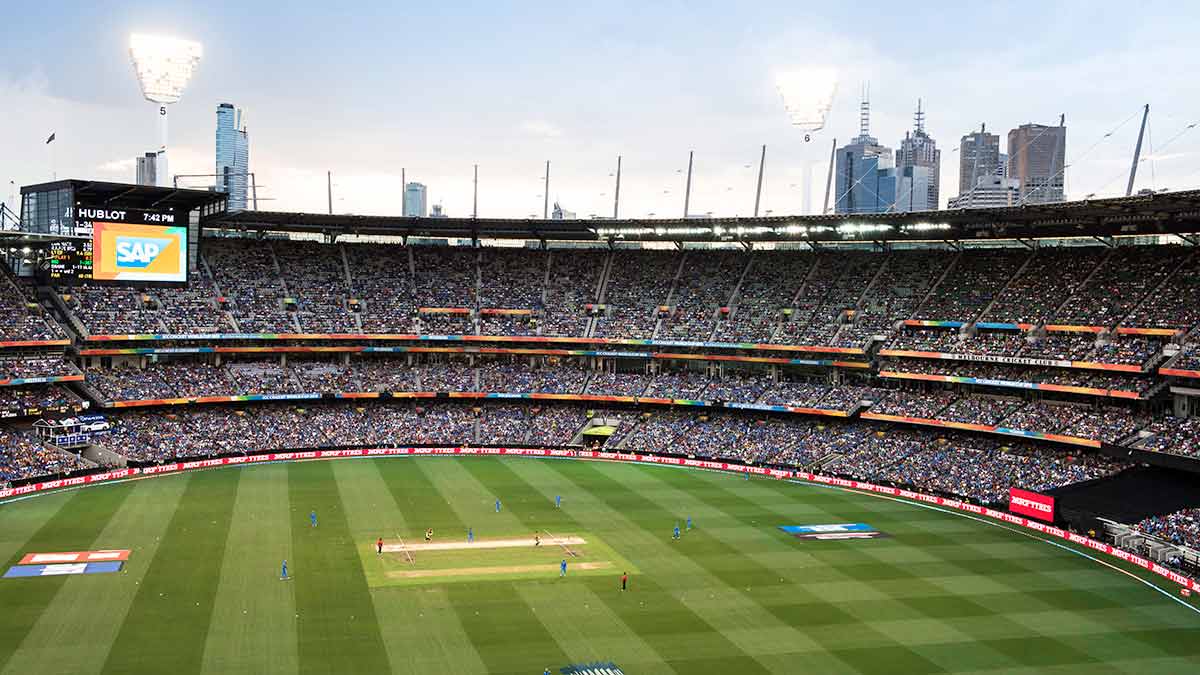 Wide view of full crowd at MCG for cricket.