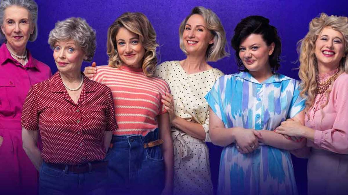 six women dressed in rural American clothes