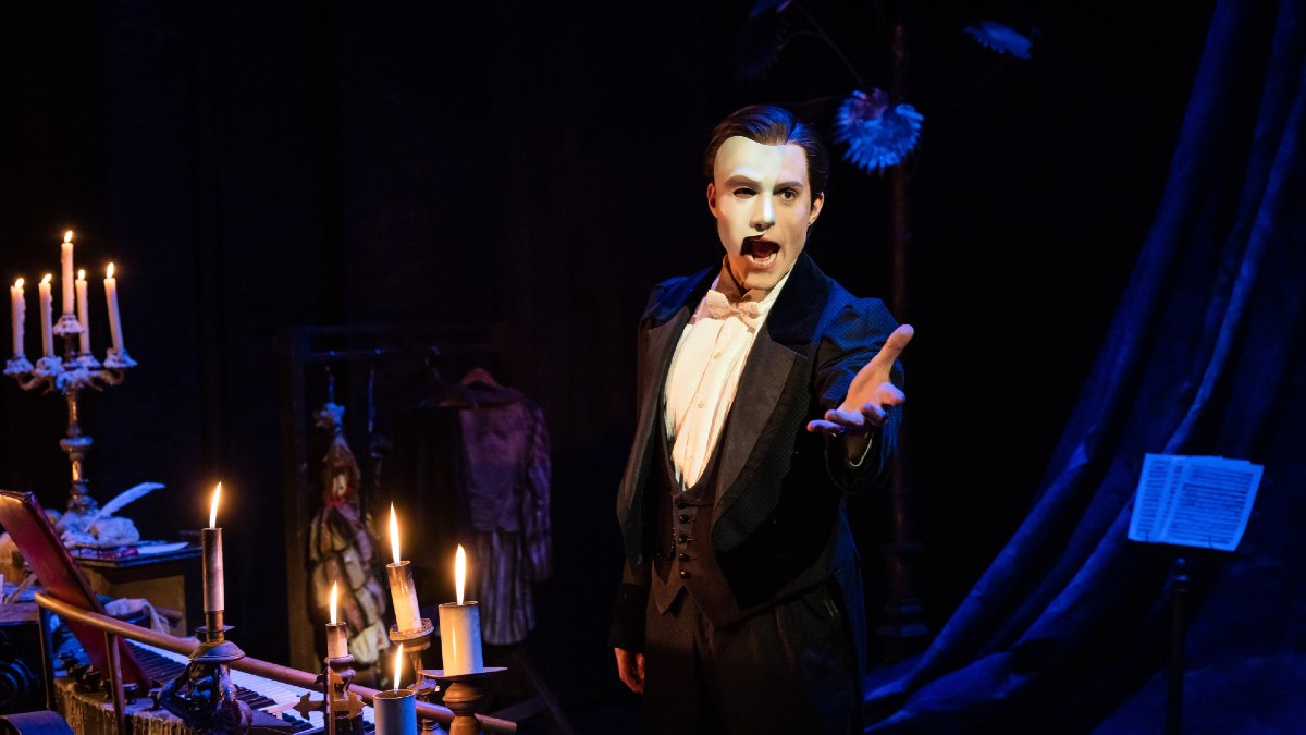 The Phantom sings dramatically in The Phantom of the Opera 
