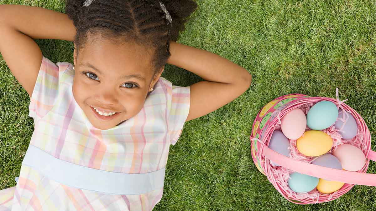 Girl with painted Easter eggs