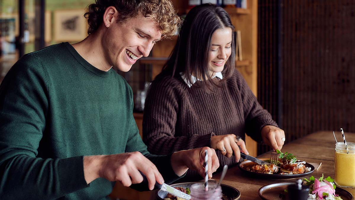 Couple enjoying a meal at Coffee Collective in Wonthaggi in Victoria.