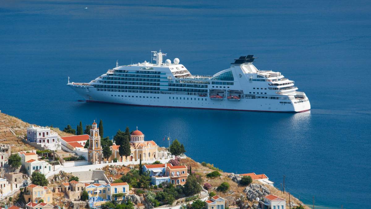 cruise ship near Mediterranean town