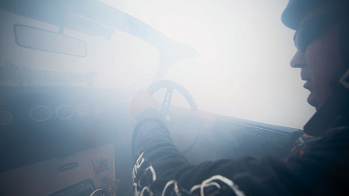 Smoke pouring into the car while doing a burnout