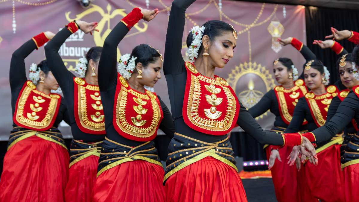 group of Indian women performing a cultural dance