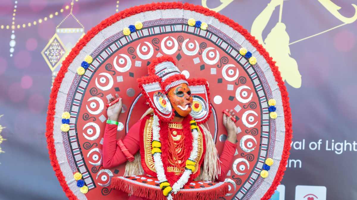 person in costume at Diwali