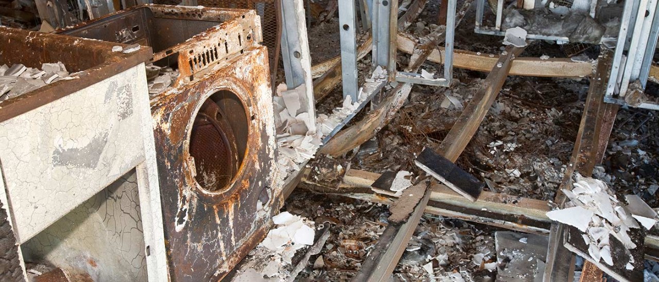 Burnt out laundry and home after bushfire.