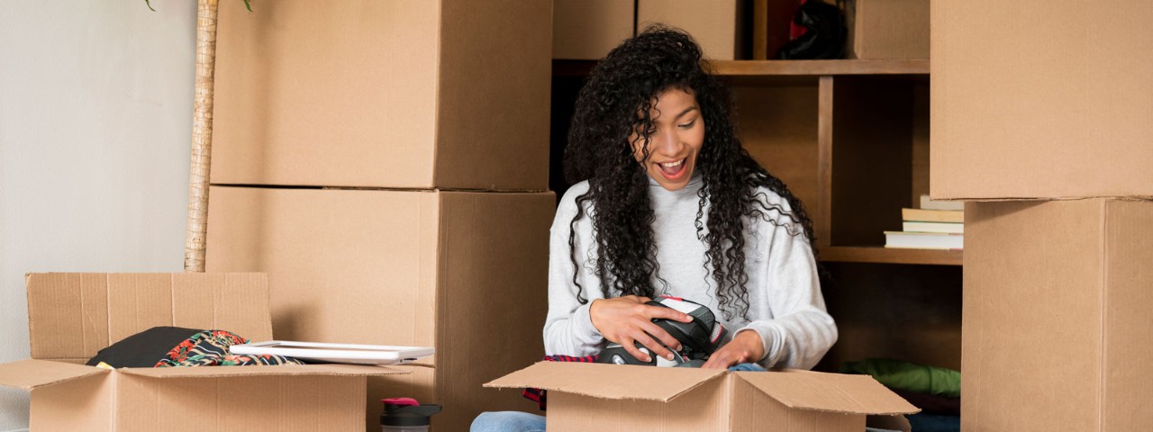 woman unpacking new house
