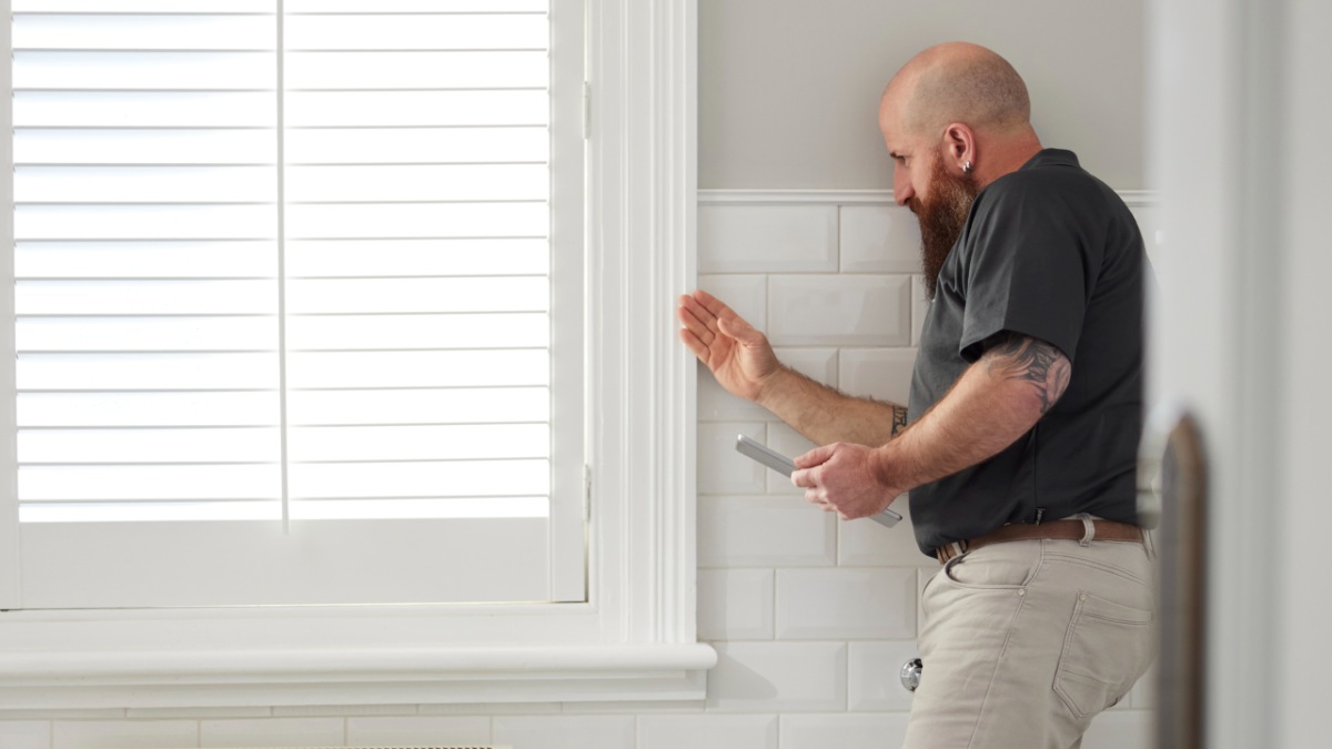 property inspector in bathroom