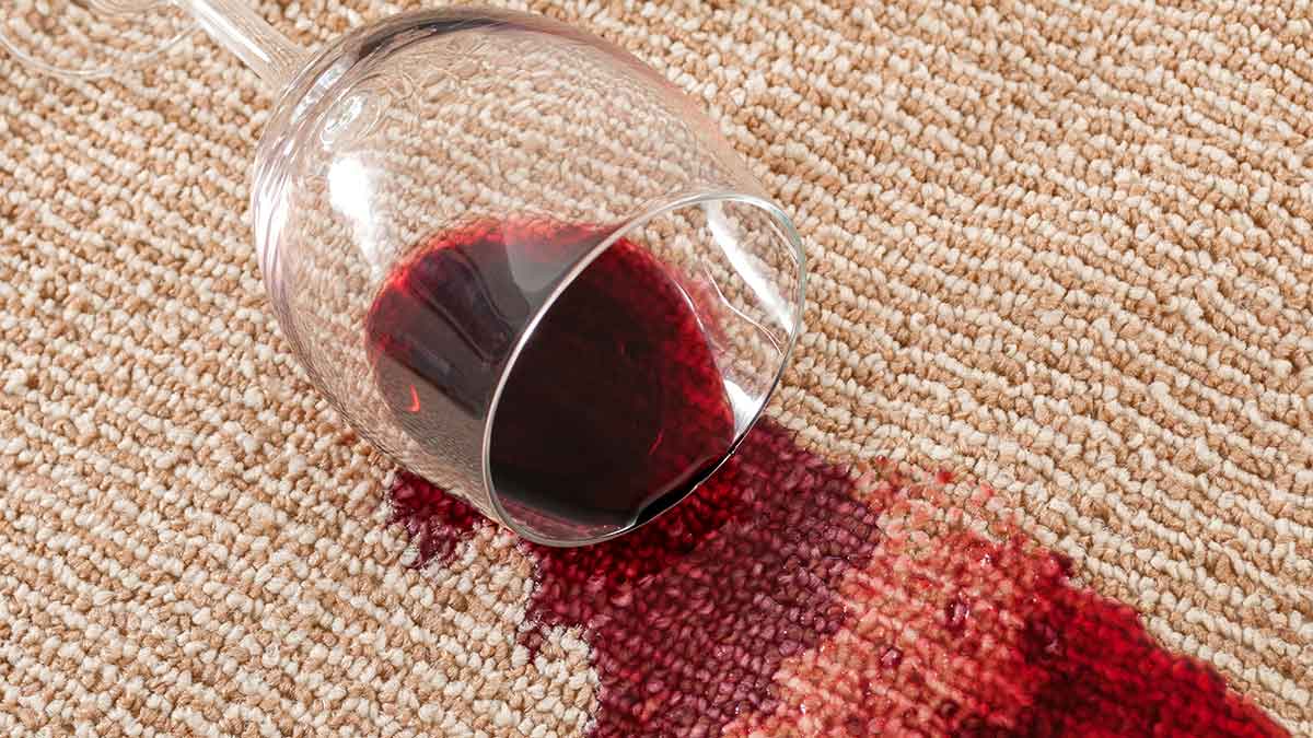 wine spilt on beige carpet