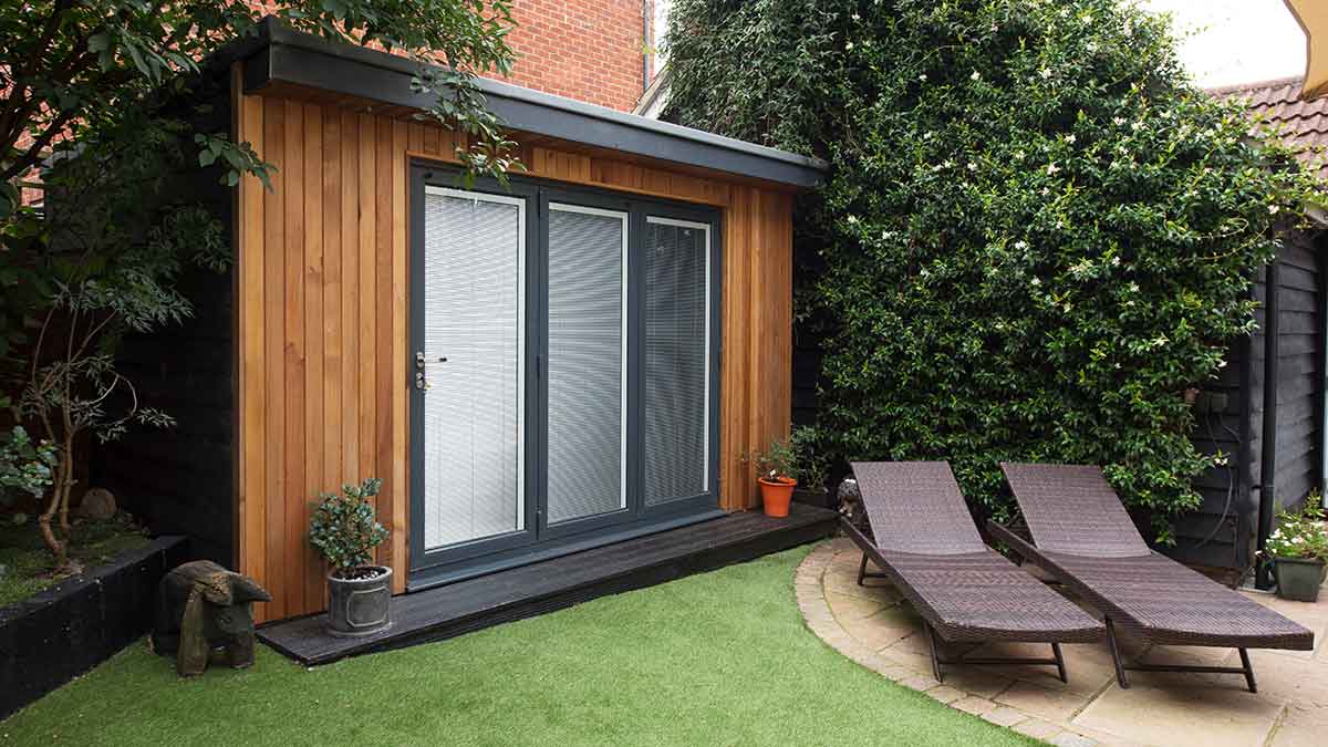 fake grass outside a modern home