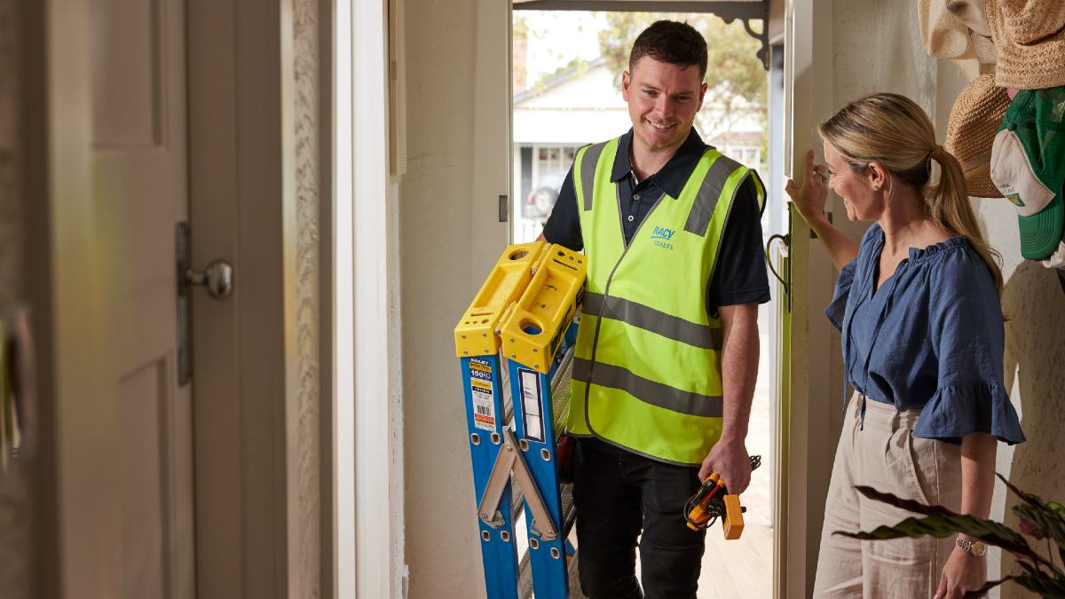 RACV electrician arriving at home with ladder and tools