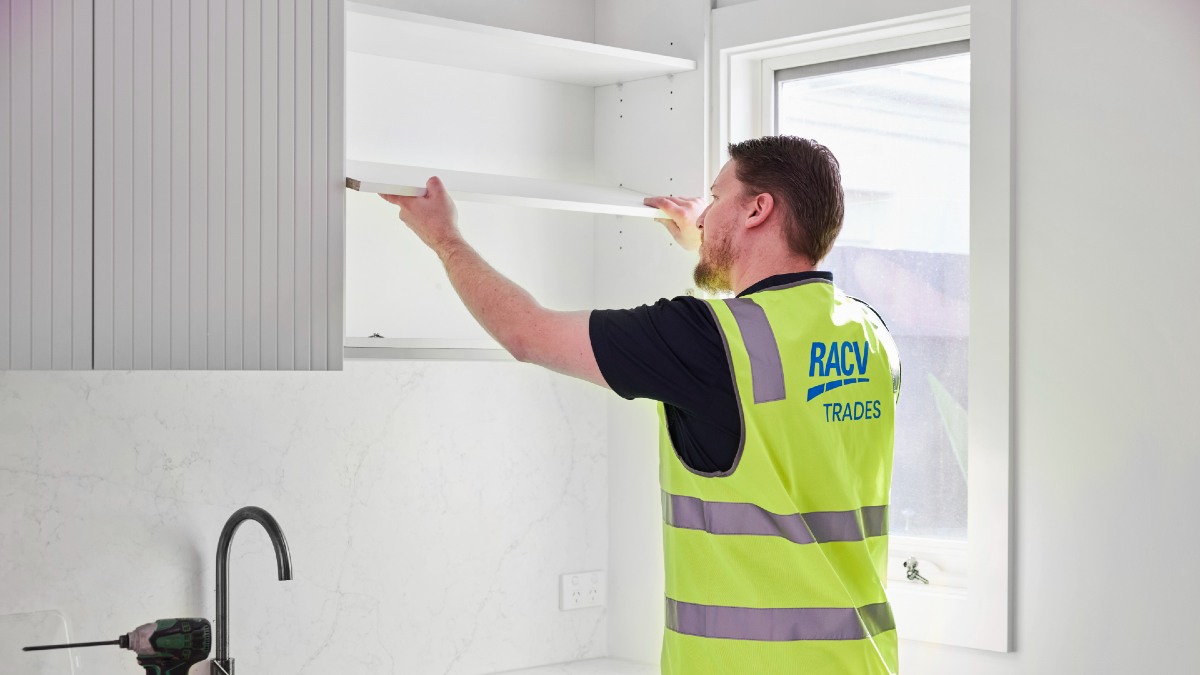 RACV tradie carpenter installing shelves