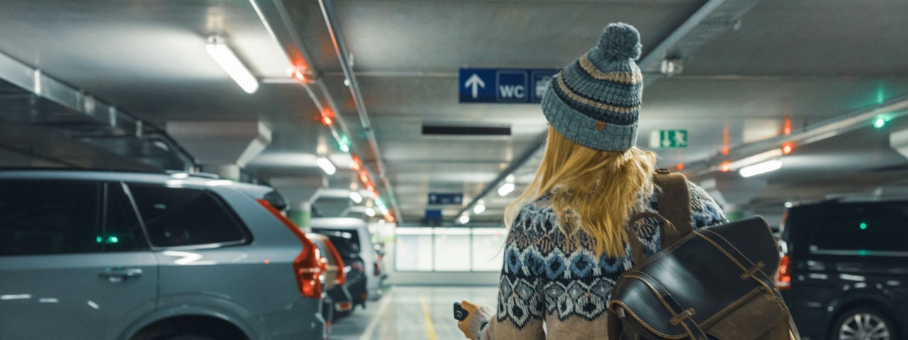 1832034660 woman in underground car park