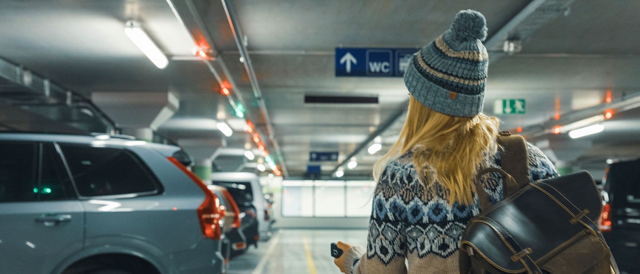 woman-carpark-Getty-1832034660-1400x600.jpg Woman walking towards car in underground carpark