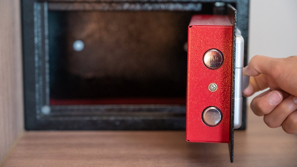 person opening a durable home safe