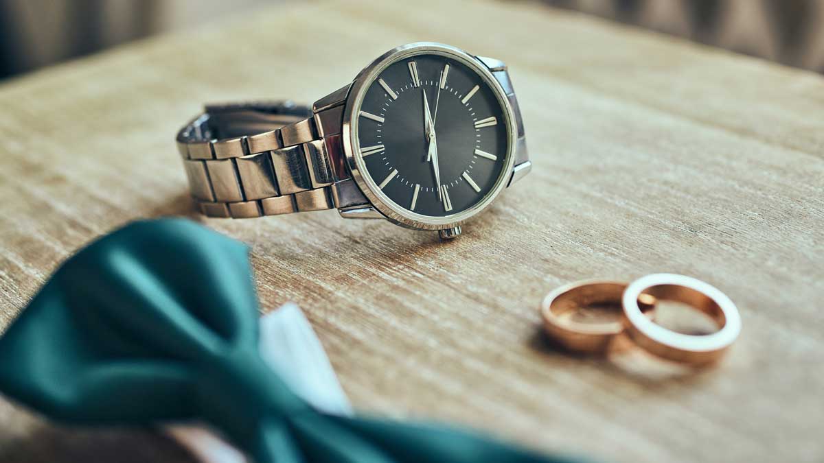 close up of watch and rings