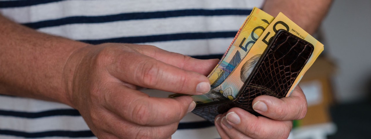 man counting cash