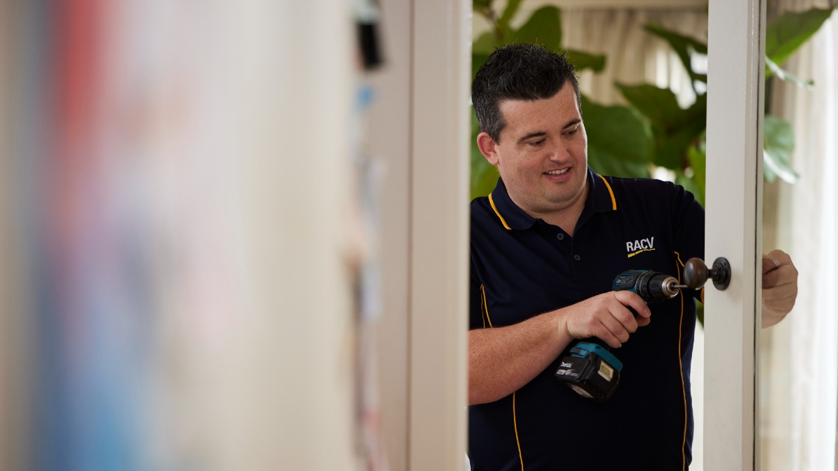 RACV locksmith fixing door