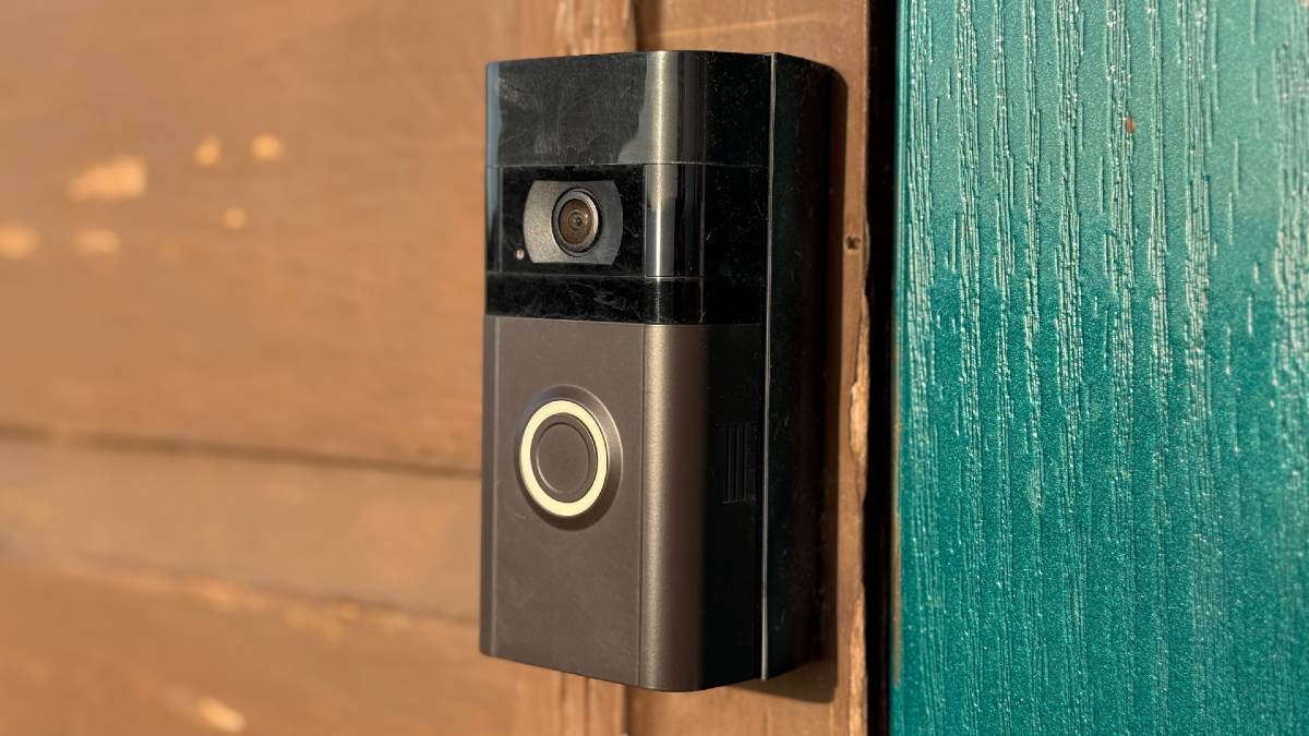 black video doorbell installed on a wall
