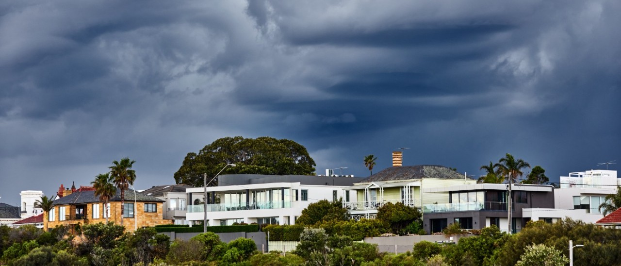 Houses with storm clouds