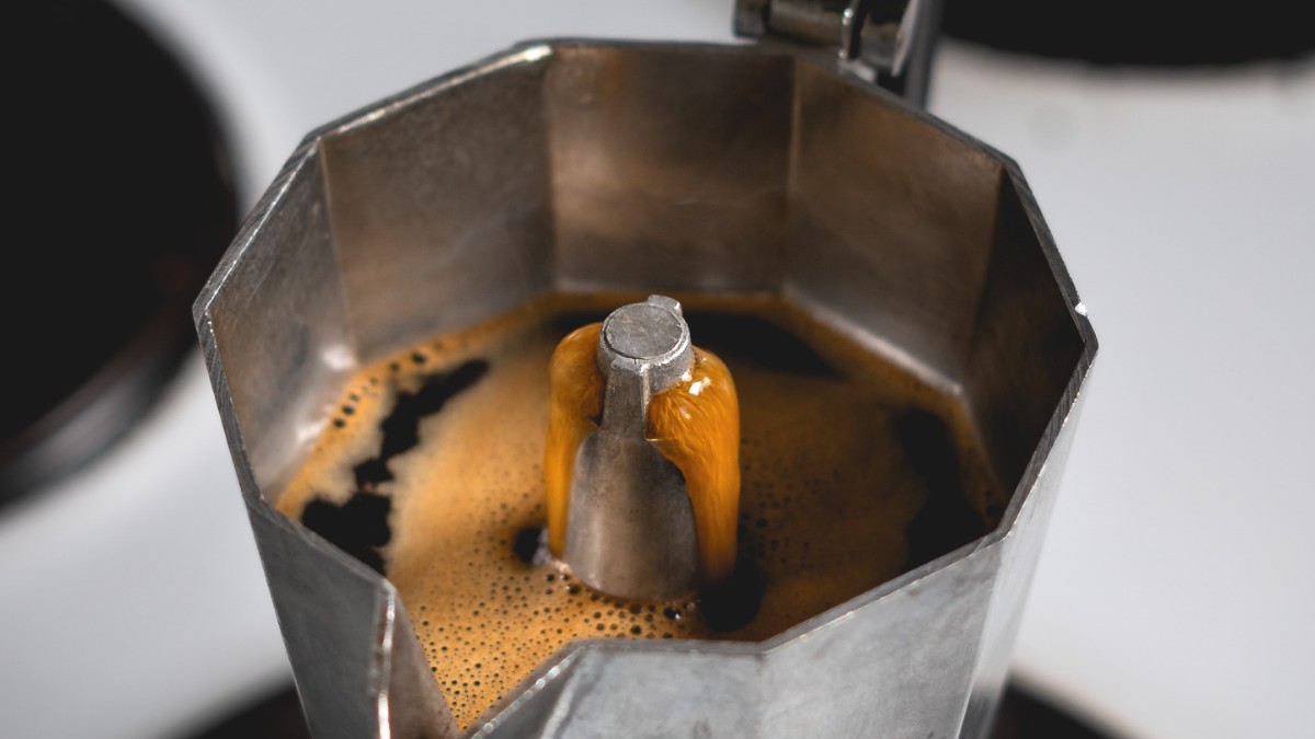 grey metal moka pot filled with fresh coffee