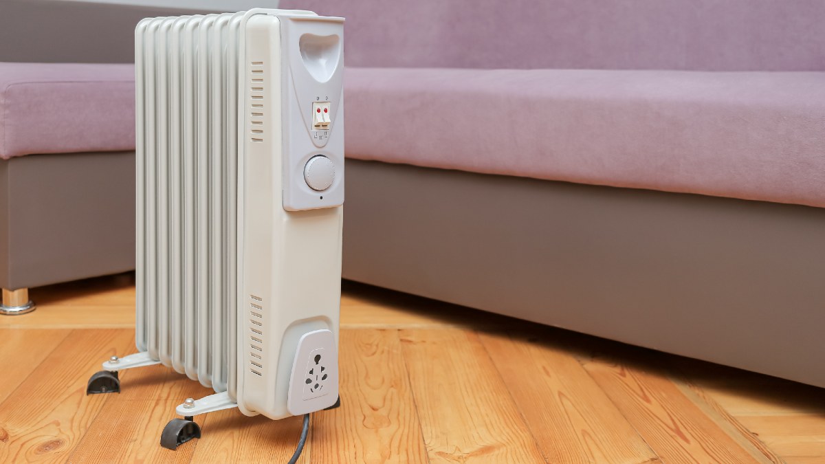 portable heater near a couch