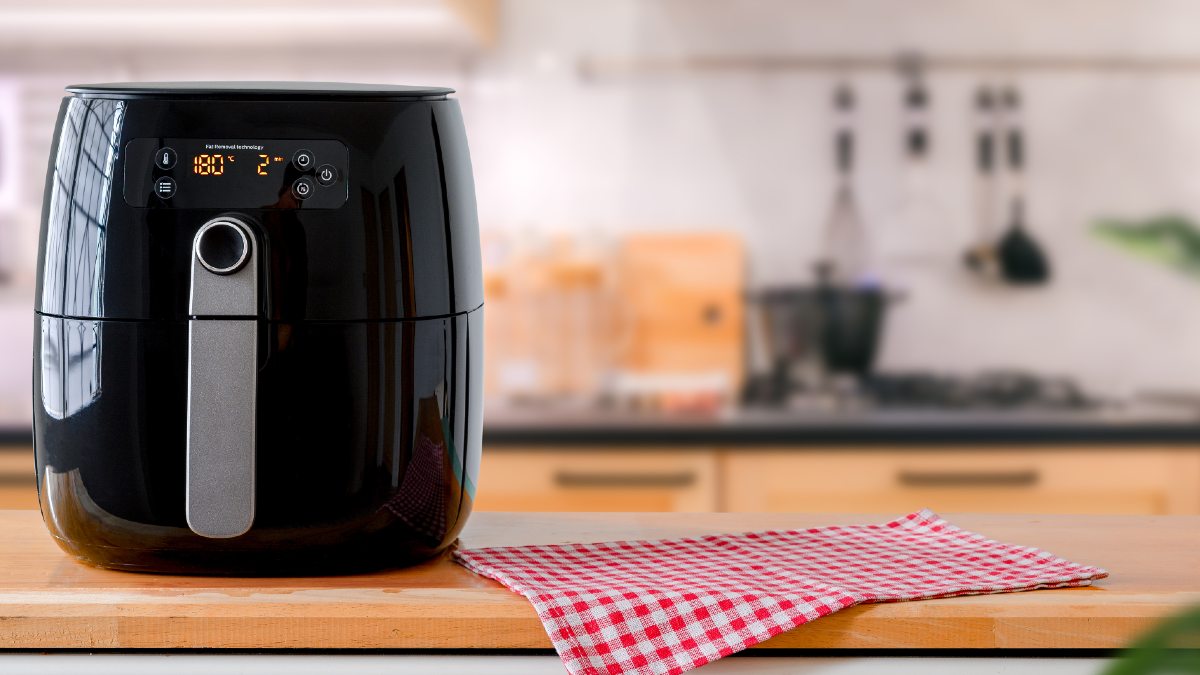 black air fryer on a kitchen counter