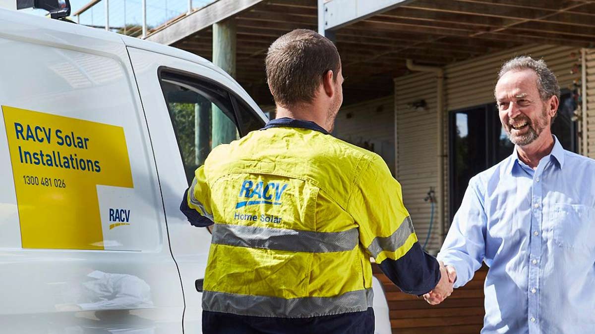 RACV Solar installing professional talking to client