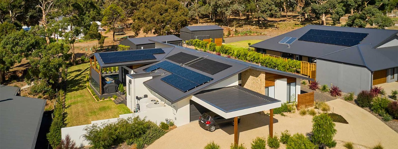 an Australian property with solar panels and solar battery