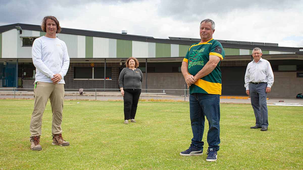 Group photo pf four people on recreational oval