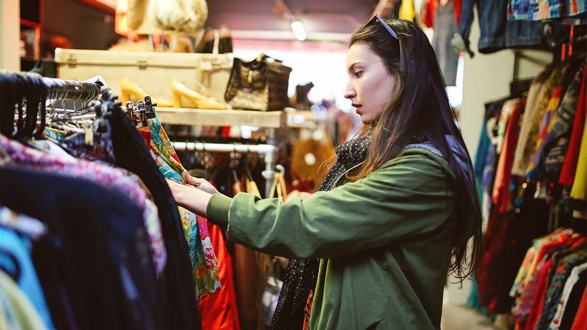 Woman shopping for vintage clothing