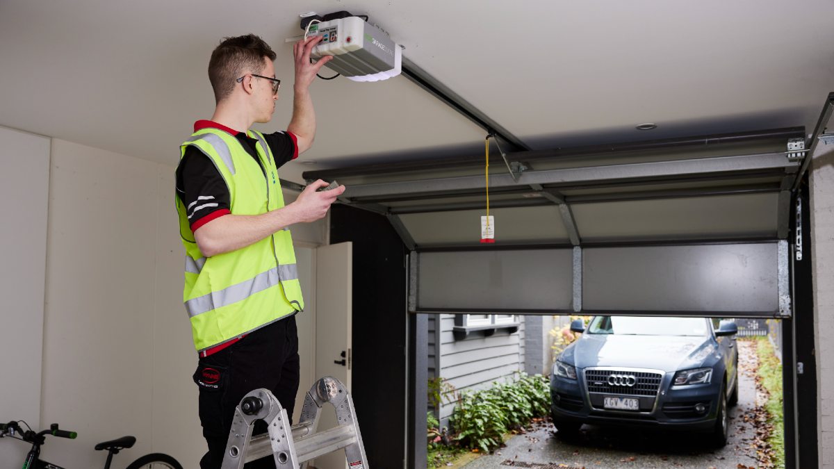 RACV electrician fixing garage door