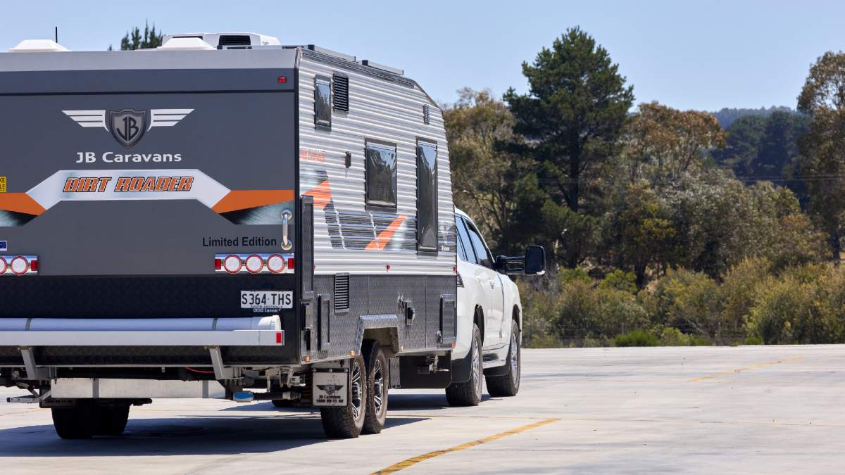 caravan towed by car on the Western Highway