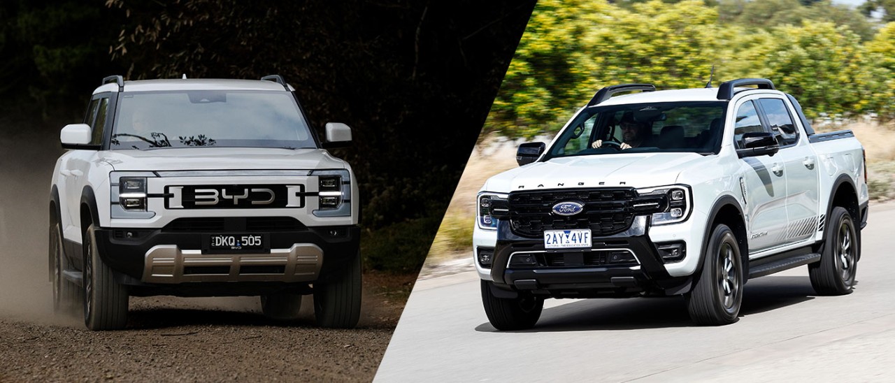 2025-BYD-Shark-6-vs-Ford-Ranger-PHEV-comparison-banner-1400x600 Split image of white BYD Shark 6 ute on dusty dirt road and white Ford Ranger PHEV on sealed country road