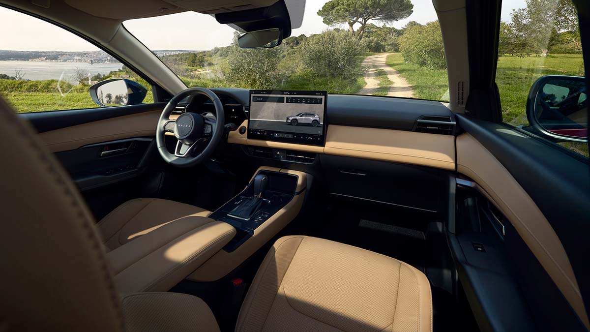 Tan leather seats with dark dash and door trim in high-series version of Mazda CX-5 SUV
